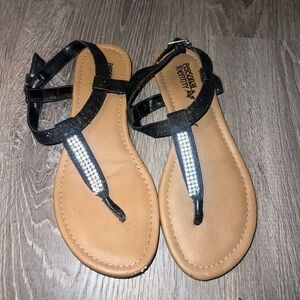 Pair of size 5 Personal Identity rhinestone flat sandals, black and tan